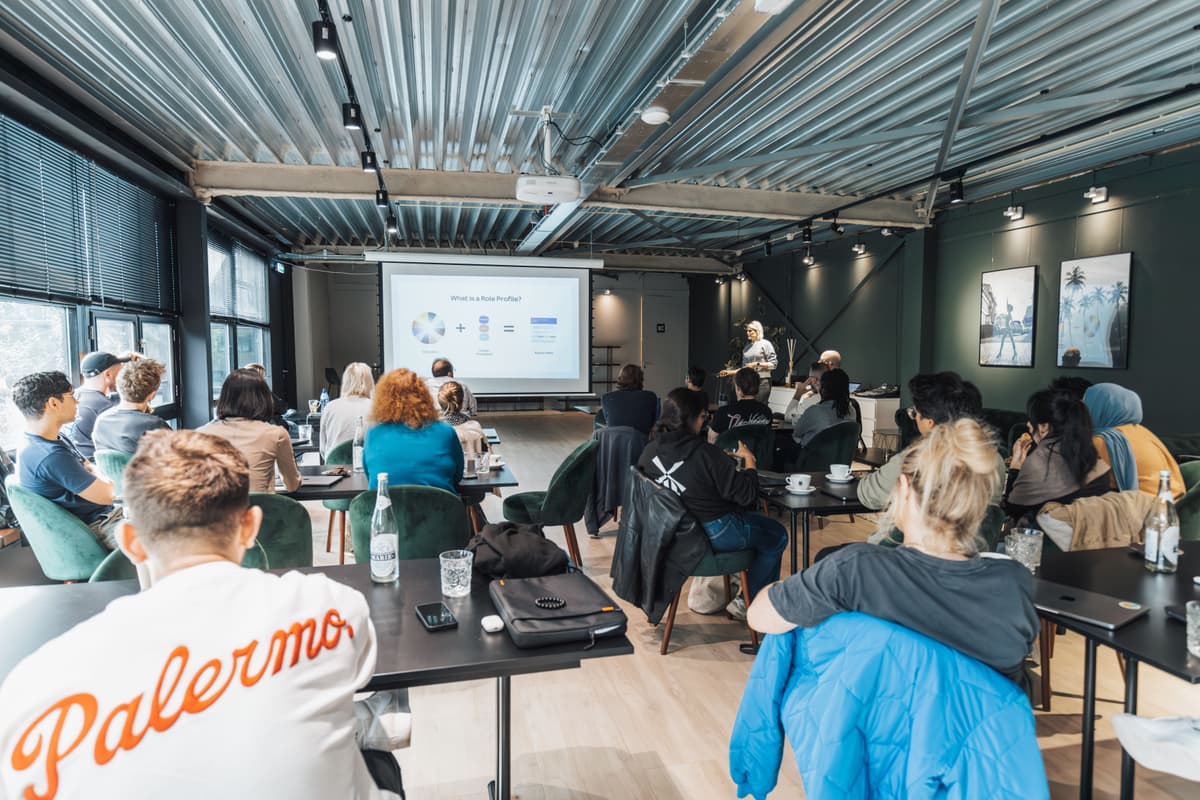 Consultant presenting strategy to client using projector